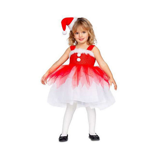 Ett litet barn i en julig klänning med röd topp och vit kjol, med ett rött tomte-diadem på huvudet.