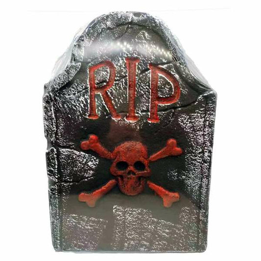 En gravsten i svart och grått med röd text "RIP" och en röd dödskalle med korslagda ben.