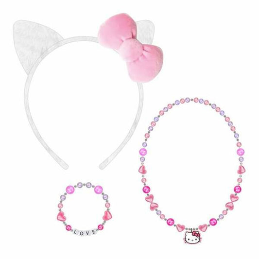 Ett kit med ett vitt diadem med kattöron och rosa rosett, ett pärlhalsband och ett pärlarmband.
