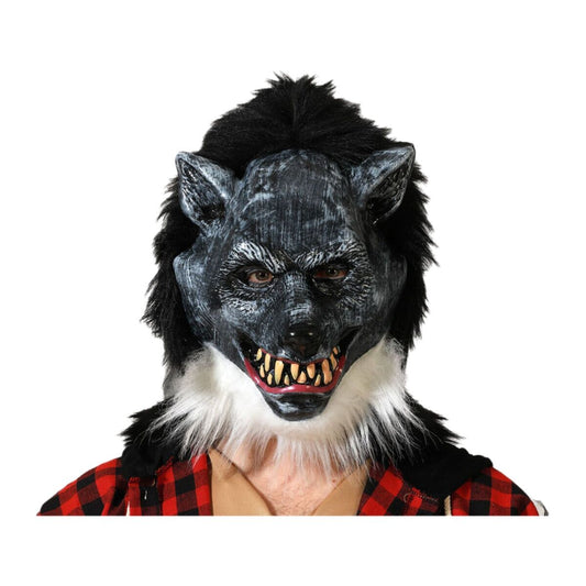 En person bär en Fasansfull Svart Varulvsmask i latex, med ett argt ansiktsuttryck och vassa, gula tänder.