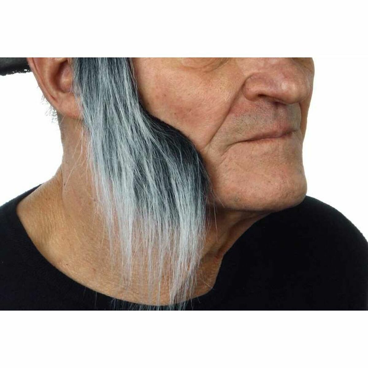 En man i profil visar upp ett par långa, yviga och gråsvarta löspolisonger, perfekta för en varulvs-look.