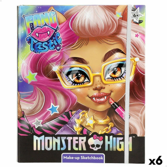 Förpackning till ett Monster High sminkset för barn, med bilden av en tjejkaraktär med rosa hår och glasögon, märkt med 'x6'.